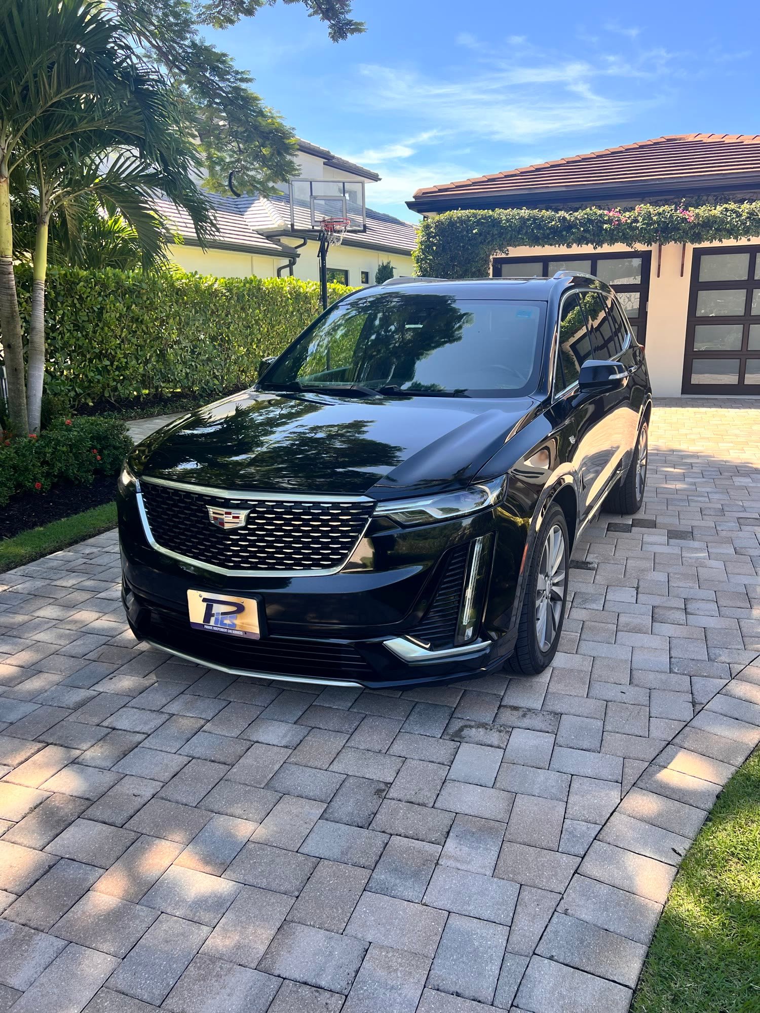 Black Cadillac luxury SUV from the Private Independent Car Services fleet in Naples